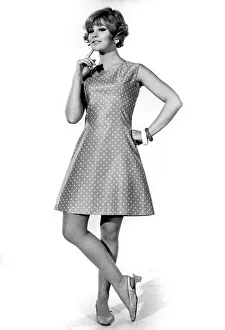 Model Marilyn Rickard wearing a sleeveless dress in sky blue cotton with white confetti