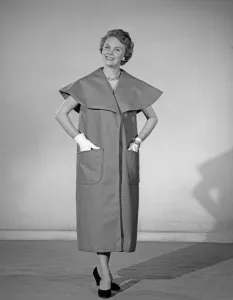 01157 Prints: Model Maureen Denham seen here wearing a felt Cape Coat made from a Reveille readers