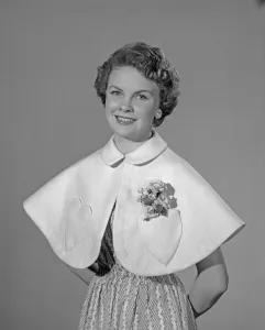 One Woman Only Prints: Model Maureen Denham seen here wearing a felt Cape made from a Reveille readers pattern