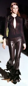 A model models at the Face of Guccis Fashion Show March 1999 wearing a