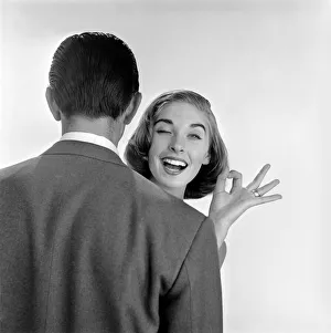 Model Pat Parish carrying out Kiss ability test for the WomenOs Sunday Mirror. July 1957
