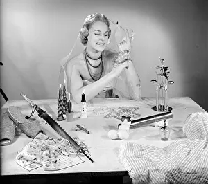 Presents Prints: Model Patti Morgan with the must have decorations and gifts for Christmas 1954
