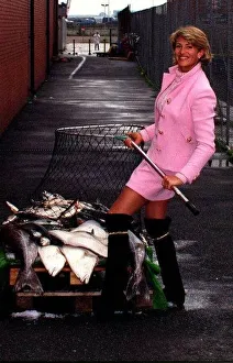 Model paula equals her weight in fish at the launch of new cod liver oil pill epd