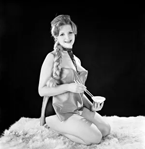 Model Peggy Cage seen here modelling a chinese style ouitfit in the Reveille studios