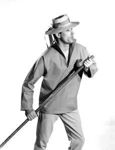 Model Peter Anthony wearing blue sailors shirt 1959