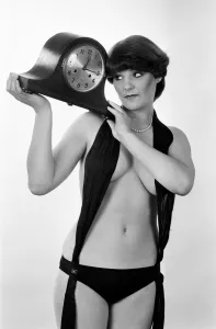 00459 Prints: Model reminding people to put their clocks back by one hour at the end of British Summer