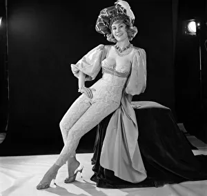 00061 Prints: Model Rita Royce seen here modelling trouser suit with matching hat. 1960 E433-002