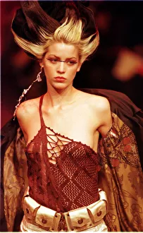 A model sports a red knitted top October 1997 designed by Christian Lacroix for