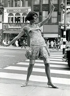 Model Victoria Vaughan stops traffic in london wearing a suit designed by Mary Quant