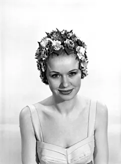 Swimming Hat Prints: Model Vyvyan Dunbar wearing bathing hats Circa 1963