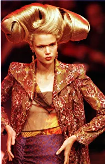 A model walking down the catwalk October 1997 showing Christian Lacrioxs latest designs