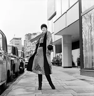 00067 Prints: Model wearing a checkered and patterned dress with matching skirt
