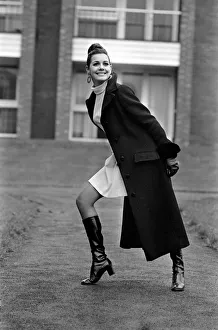 A model wearing the latest in fashions. April Royle wearing a midi (it doesn
