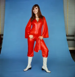 A model wearing a scarlet catsuit in gleaming cire by House of Ailish, £9