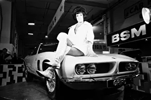 Marketing Prints: Models drapped over the latest Iso Grifo car at the 1966 London Motor Show 18th October