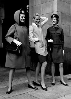 Hostess Prints: Three of the models (left) in the new bright red hooded coat zipped up to the neck