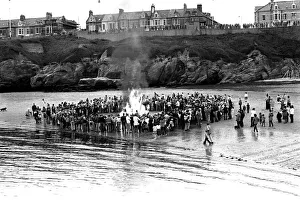 00105 Prints: Models of Viking longships are burnt on the beach at Cullercoats Bay in July 1980