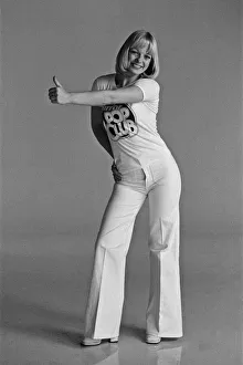 01511 Prints: Models wearing Daily Mirror Pop Club T-shirts demonstrating the new Convoy disco dance