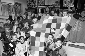 Moldgreen Junior and Infants School pulls with their knitted blanket