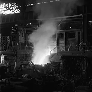 Molten steel is tapped off from one of the open hearth furnaces at the Stocksbridge