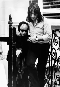 Monika Dannemann is helped up steps of building where Jimi Hendrix died