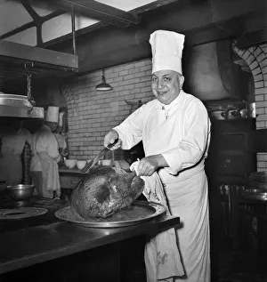 Monsieur Alban, lead chef at Savoy Hotel, with turkey. December 1949 O21983-001