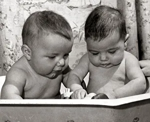 00206 Prints: Four month old Lorne Brown (left) and three month old Katherine Weldon taking a bath