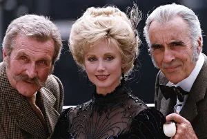 Morgan Fairchild centre with Christopher Lee right who plays the part of Sherlock Holmes