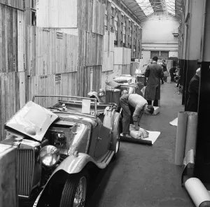 Crates Prints: Morris MG Roadsters fresh off the production line await packing for export at Morris