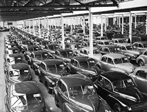 Morris Minor Low Light Sedans fresh of the production line being packed for export