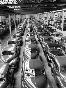 00460 Prints: Morris Minor Low Light Sedans fresh of the production line being packed for export
