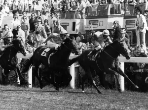 Morston with Eddie Hide wins the Derby ahead of Lester Piggott on Cava Doro at Epsom