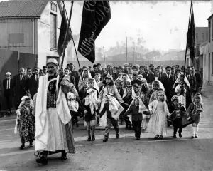 Moslems march in procession through the streets of Cardiff for the official laying of