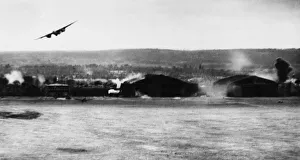 01215 Prints: Mosquitos attack Geal airfield. (Picture) In this striking picture bomb bursts are