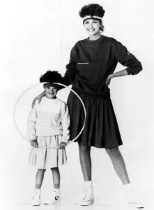 Skirts Prints: Mother and daughter wearing matching sweat shirts and full skirts by Jeffrey Rogers