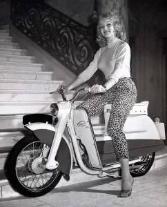 Leggings Prints: Motor. 65cc 4 stroke bike which costs £98. 18s. 6d Actress Vanda Hudson