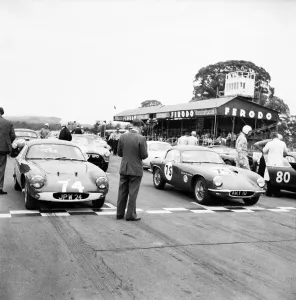 Motor Sports Prints: Motor car racing at Goodwood. Cars on the starting grid before the race