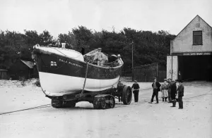 The motor lifeboat William Maynard leaves the boathouse for a practice launch
