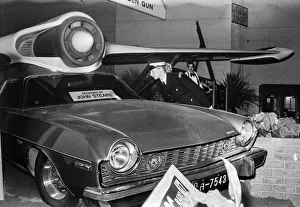 00846 Prints: Motor Show Preview Day at Earls Court. Traffic Warden Jacqui Smith looks