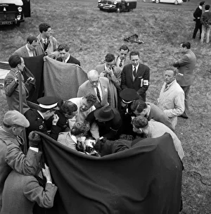 Racing Driver Prints: Motor races at Goodwood. Ace racing driver Stirling Moss had a miracle escape from death
