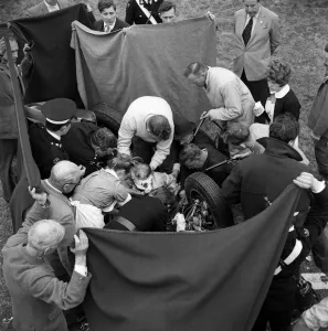Motor races at Goodwood. Ace racing driver Stirling Moss had a miracle escape from death