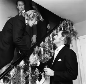 Congratulations Prints: Motor racing driver & groom James Hunt shakes hands with Graham Hill on his wedding day