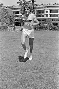 Jogging Prints: Motor Racing Driver James Hunt jogging and smiling to the camera