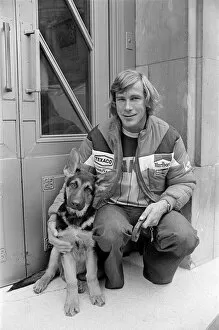 00930 Collection: Motor Racing Driver James Hunt with Oscar, his German Shepherd dog