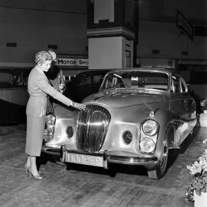 Society Prints: Motor Show: Sir Bernard and Lady Docker photographed beside their new