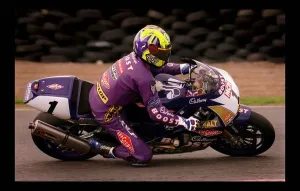 Track Days Prints: Motorcycle Racing August 1998 cyclist in purple Boost sponsored suit