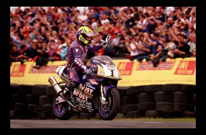 Motorcycle racing August 1998 cyclist waves to crowds
