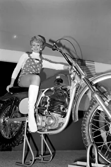 Motorcycle Show: Maxine Maxwell 25 year old model from Southampton sitting on bike
