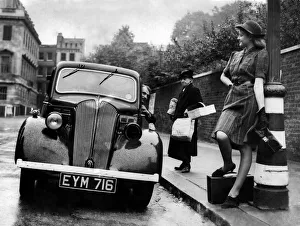 Generations Prints: Motorist seen here offer a young woman a lift as he ignores the elderly woman with
