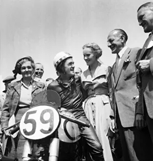 00023 Prints: Motorsport. Isle of Man TT Races 1953 Ray Aman receives congratulations after